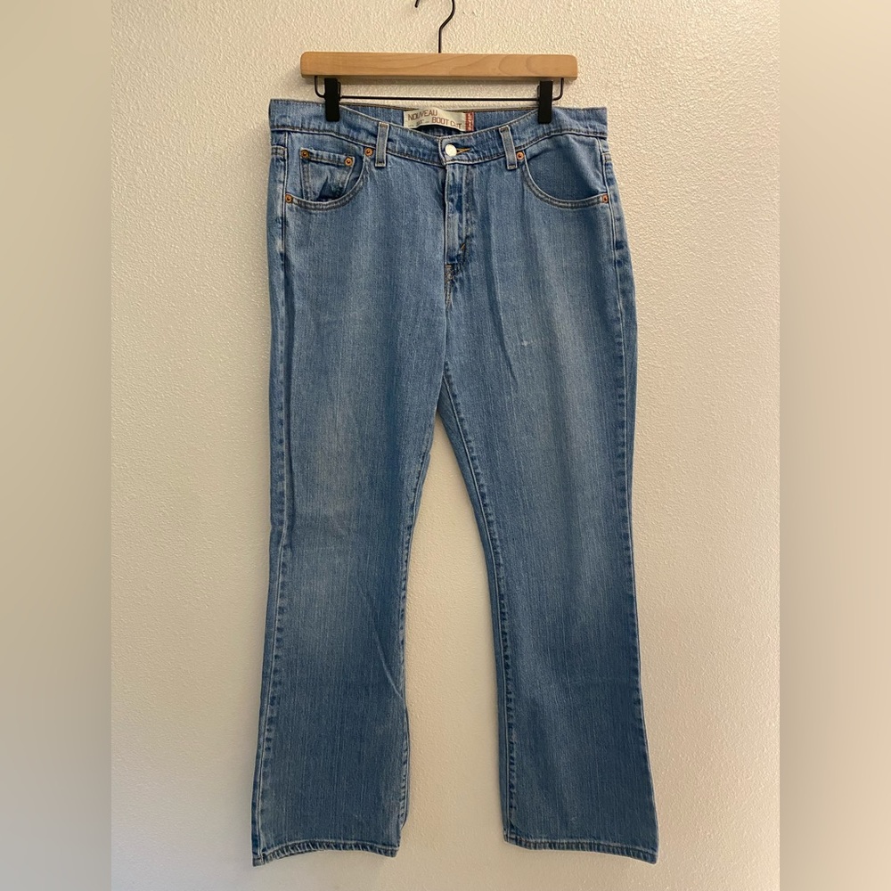 Thrifted jeans with wide bottoms